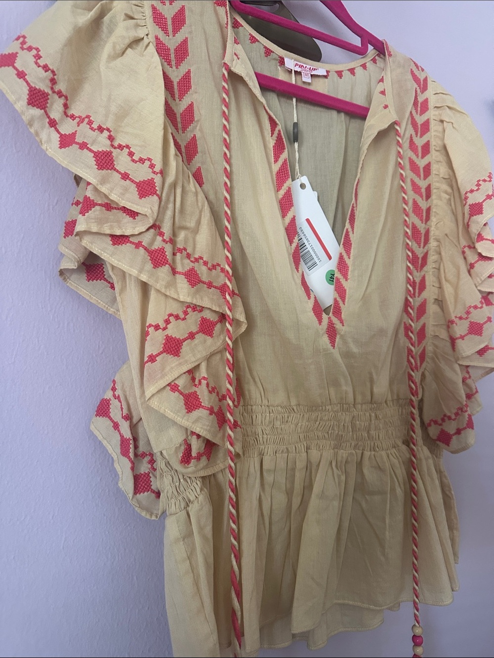 Pin-Up Stars Cream Peplum Blouse with Pink Embroidery and Tassel Ties - Picture 6 of 6